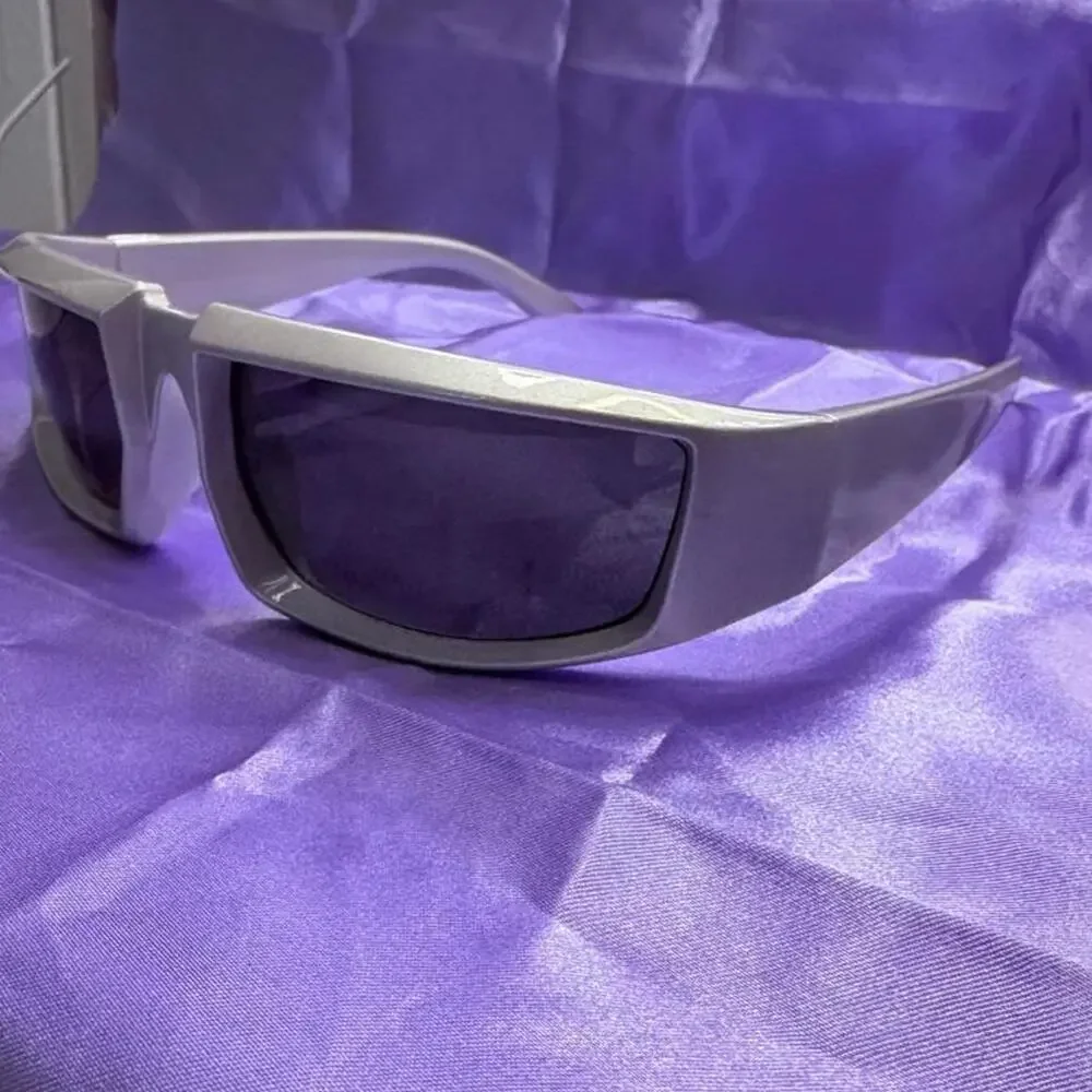 Silver unisex wraparound sunglasses with dark tinted lenses futuristic cybercore